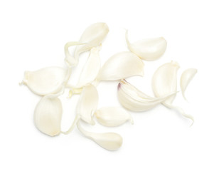 Young garlic separated cloves stack top view isolated on white background.