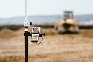 close up details of gps and theodolite in surveying industry. Construction site details