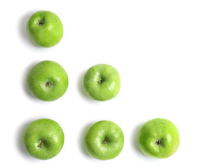 Fresh green apples on white background, top view