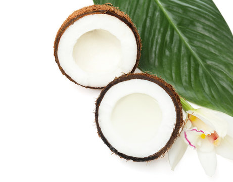 Coconuts with fresh water on white background