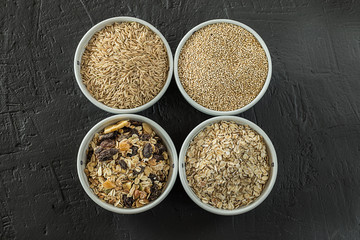 Quinoa, brown rice, seeds and oats . Whole grain and organic food concept for vegetarians.Whole-grain carbohydrates