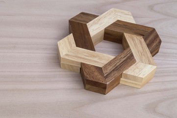 puzzle in the shape of a wooden star