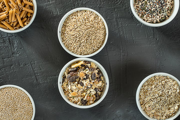 Quinoa, brown rice, seeds and oats . Whole grain and organic food concept for vegetarians