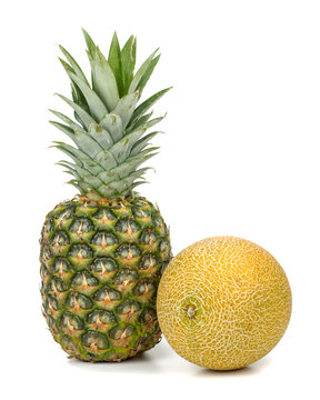 pineapple and melon on a white background