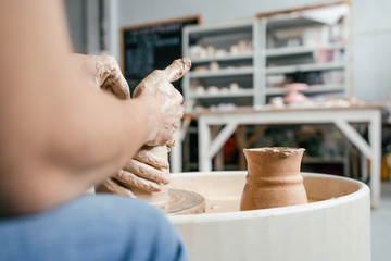 Man and pregnant girl molded ceramic vase