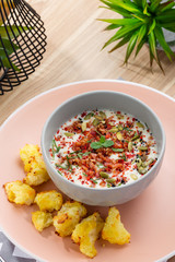 Vegetable cream soup (veloute) in bowl with croutons