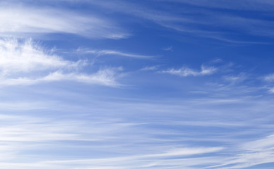 Skyscape: Autumnal cloudscape with mares’ tails clouds against the blue sky over Eastern...