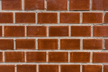 Building wall with brown tiles background