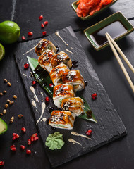 sushi on the black background