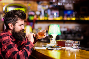 Drunk and relaxed concept. Man with drunk face sit alone