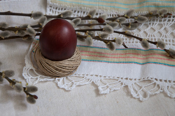The painted egg and willow twigs. Easter day.