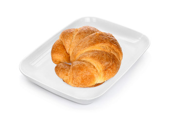 croissant in the white plate isolated on white background