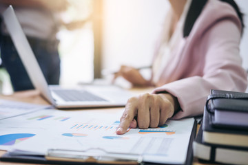 Business team meeting present. secretary presentation new idea and making report to professional investor with new finance project plan during discussion at meeting