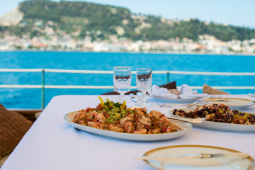 Fototapeta na wymiar lunch about to be served aboard a yacht outside of zakynthos