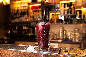 Colorful Red blueberry cocktail in bar