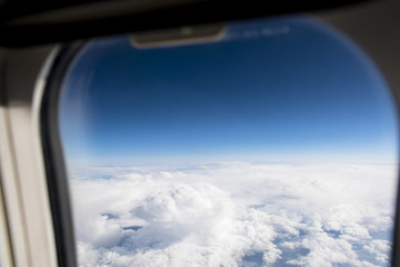 Beautiful clouds view from window of airplane