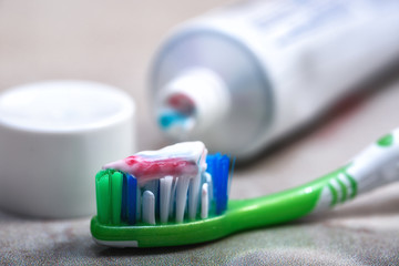 toothbrush and toothpaste on the shelf