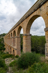 Obraz premium Roman Aqueduct Pont del Diable in Tarragona, Spain