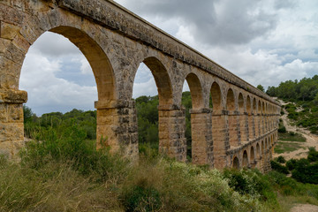 Obraz premium Roman Aqueduct Pont del Diable in Tarragona, Spain