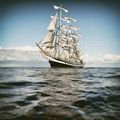 Sailing ship in the blue sea.  Yachting. Sailing