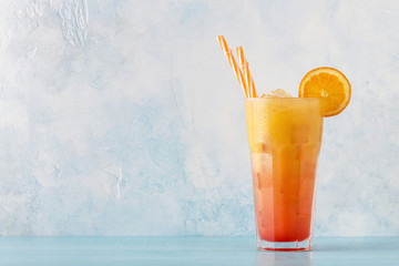 Juicy Orange and Red Tequila Sunrise with ice