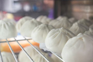 steamed stuff bun favorite tradtional chinese food in asia.It is a popular snack sold mostly in Chinese restaurants.Another name is Siopao made from a combination of pork, chicken, beef, shrimp.