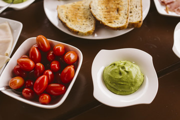Breakfast with vegetables and ham.