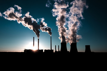 coal fired power station silhouette at sunset, Pocerady, Czech republic
