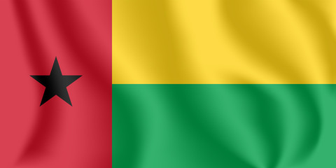 Flag of Guinea-Bissau. Realistic waving flag of Republic of Guinea-Bissau. Fabric textured flowing flag of Guinea-Bissau.