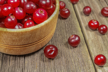 Cranberries in a wooden cup