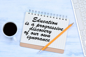 Education is a progressive discovery of our own ignorance. Text on notebook