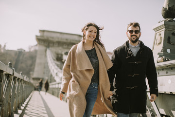 Loving couple on Chain bridge, Budapest