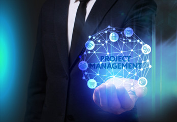Business, Technology, Internet and network concept. Young businessman working on a virtual screen of the future and sees the inscription: Project management