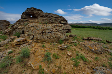 Shirkala. West Kazakhstan. In the boundless steppe around the famous mount Shirkala scattered huge picturesque stone balls-nodules.
