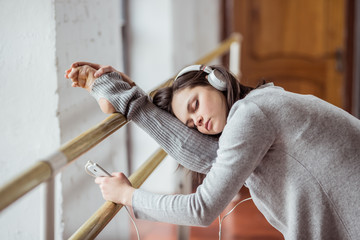 Young ballerina on training indoors