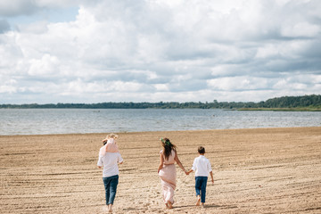 Family walking along the beach