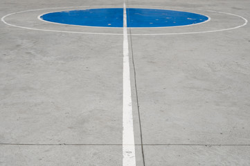 white center lines on concrete street basketball court - sport field
