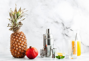 preparation of a drink, a cocktail on a marble table. all the necessary tools, utensils and ingredients. copy space