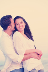 young couple  on beach have fun