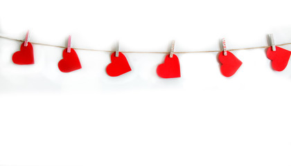 Red heart hanging on the clothesline