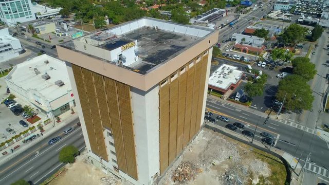 Aerial pull out reveal Miami old immigration buidling demolished 2018