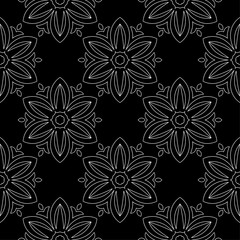 White flowers on black background. Ornamental seamless pattern