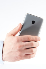 Back view of smartphone in hand
