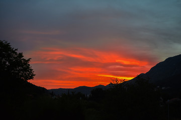 orange sunset over hills colorful sky 