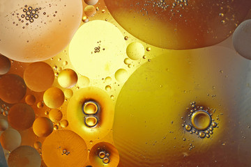 Fantastic shapes of colored circles on a colorful background. Screensaver. Space background. Abstract art.
