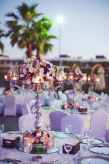 Luxury wedding decorated round tables