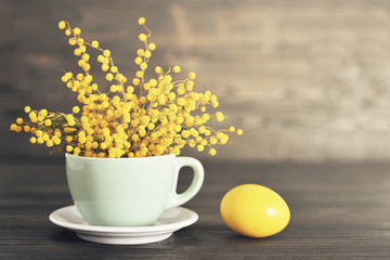 Easter card with Easter egg and spring flowers