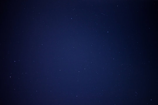 A blue night sky full of stars
