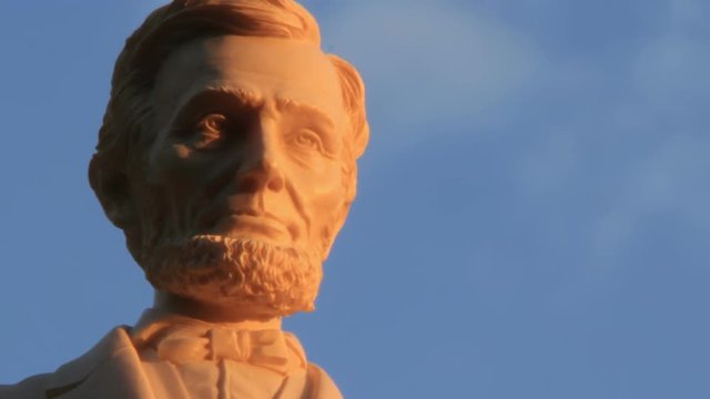 Abraham Lincoln statue in sunset time lapse