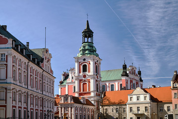 Fototapeta na wymiar building and belfry of baroque Catholic Church in Poznan.
